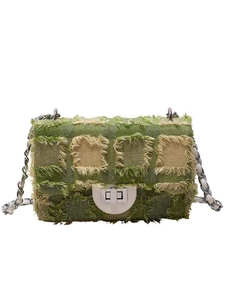 Green quilted tweed chain crossbody bag with fringe edges and silver buckle