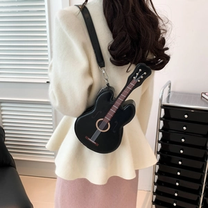 Unique violin-shaped black shoulder bag for women with intricate musical instrument details