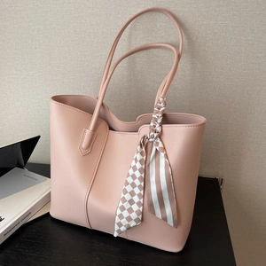 Pink large capacity tote bag with wave-edge design and elegant patterned scarf