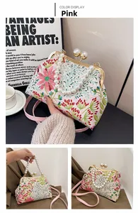 Detail der rosa bestickten Handtasche mit Perlengriff und goldenem Verschluss