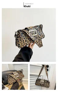 Detail view of khaki leopard print shoulder bag with oversized silver square buckle