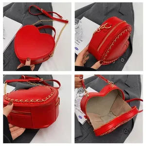 Detailed interior and exterior views of a red heart-shaped crossbody bag with gold chain