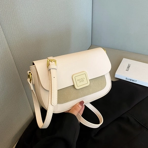 Minimalist beige and green crossbody bag with vintage square flap and metal buckle