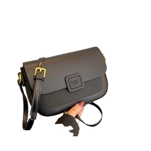 Minimalist black leather crossbody square bag with adjustable strap and gold hardware