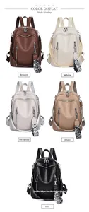 Color display of soft faux leather backpacks with printed straps in five neutral tones