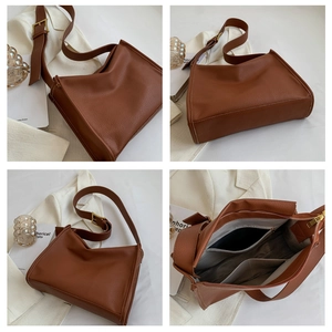 Detailed views of brown pebble leather tote bag showing spacious interior and golden hardware