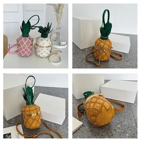 Détails de sacs seaux créatifs en forme d'ananas avec feuilles et bandoulières