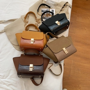 Chic wing-shaped crossbody bags in matte crocodile texture with metal chain straps