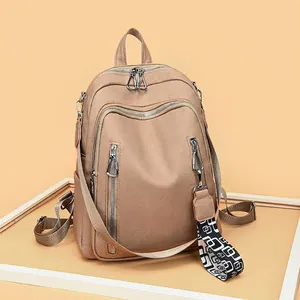 Fashion khaki soft leather backpack for women with geometric pattern shoulder strap