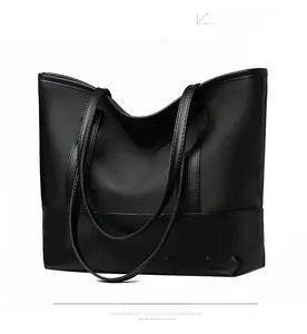 Side view of large capacity black PU leather tote bag with wide bottom design