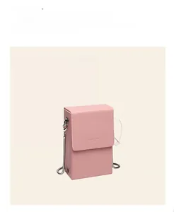 Vertical mini purple leather phone bag detail featuring metal chain and flap closure