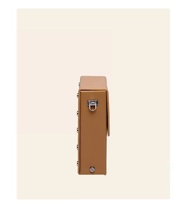 Side view of brown rectangle cigarette bag with silver vintage metal buckle and studs