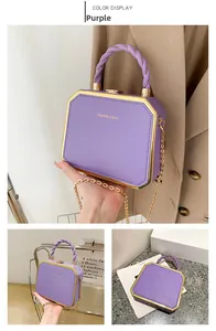 Detailed views of a purple octagonal box bag with gold chain and woven handle