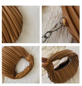 Détail du sac à main plissé marron avec poignée nouée, chaîne et fermeture éclair