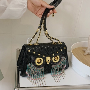 Quilted owl-shaped crossbody bag with colorful bead fringe and gold chain strap