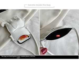 Vue intérieure montrant la capacité de rangement pour téléphone dans le sac éléphant