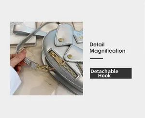 Detail magnification of the detachable hook on a silver motorcycle style shoulder bag
