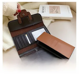 Detail of bifold wallet with multiple card slots and a secure metal zipper pocket