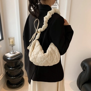 Chic beige quilted cloud bag with pleated shoulder strap and crescent moon shape