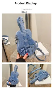 Detailed close-up of blue denim guitar-shaped crossbody bag with metal knobs and studs