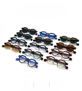 Array of geometric sunglasses in assorted colors including black and tortoise shell