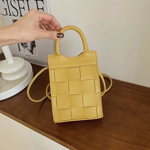 Handheld woven crossbody square bag in bright ginger yellow with woven PU leather texture