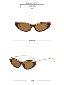 Occhiali da sole cat eye con montatura tartarugata e lenti color tè in due viste