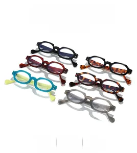Detail view of retro thick square eyewear frames in multiple assorted colors and finishes