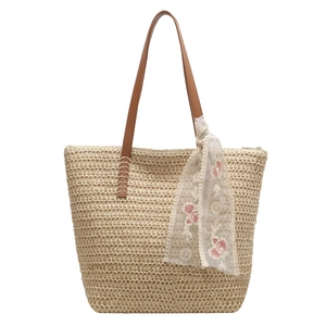 Summer woven straw tote bag with brown leather straps and floral lace embroidery