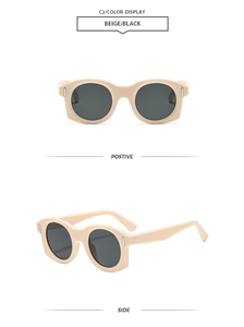 Détail des lunettes de soleil rétro beiges à monture polygonale et verres noirs