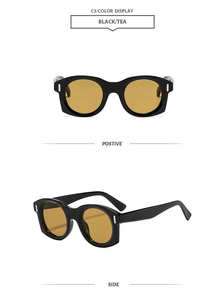 Vues de face et de profil de lunettes de soleil vintage noires à verres marrons