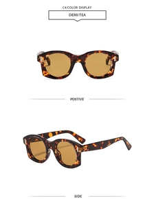 Détail de lunettes de soleil polygonales en écaille avec charnières solides et verres thé