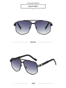 Detail view of double bridge pilot sunglasses with black metal frame and gradient gray lenses