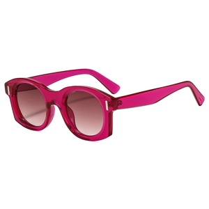 Lunettes de soleil polygonales rétro avec monture rose translucide et verres dégradés