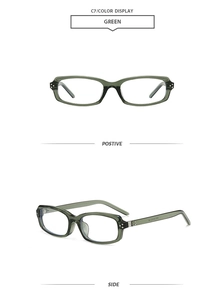 Detail of green square sunglasses frame with metal rivets on polished temples