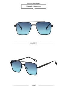 Detail view of double bridge sunglasses with golden frames and gray blue gradient lenses