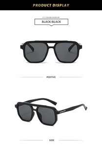 Detail view of black square aviator sunglasses with double bridge and gold metal accents