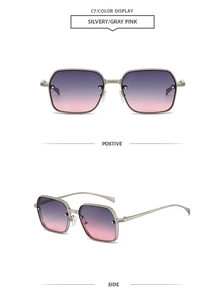 Détail de lunettes de soleil carrées en métal argenté avec texture moletée et verres dégradés