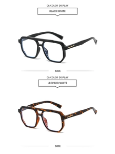 Detail view of vintage double-bridge sunglasses in classic black and tortoiseshell finish