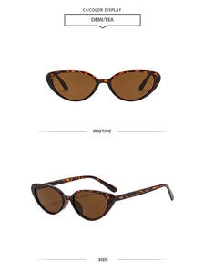 Detail view of demi tea cat eye sunglasses with silver rivets and amber lenses