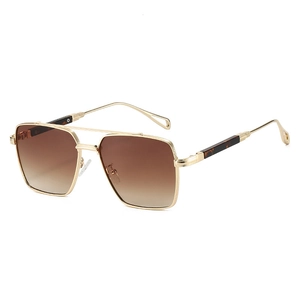 Modern double bridge aviator sunglasses with gold metal frame and brown gradient lenses
