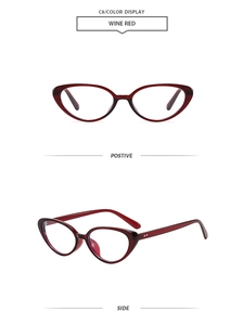Detail view of wine red cat-eye sunglasses with metal hinges and classic retro frame design