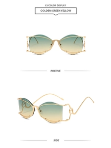Detail of rimless polygon sunglasses with golden M-logo temple and green-yellow gradient lens