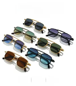 Macro shot of stylish square metal sunglass frames with detailed nose bridge and tinted lenses