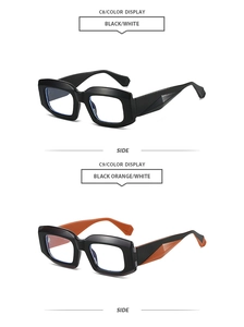 Detailansicht der stilvollen geometrischen Sonnenbrille in Schwarz und Schwarz-Orange