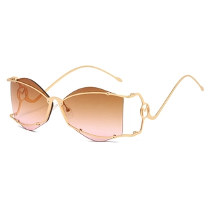 Fashionable rimless gold metal sunglasses with M logo and brown gradient lenses