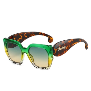Lunettes de soleil oversize tendance avec monture dégradé vert-jaune et branches écaille