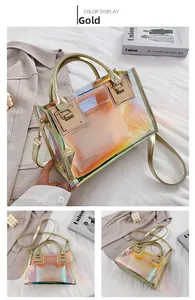 Detailed view of gold holographic laser PVC handbag with adjustable strap and inner pouch