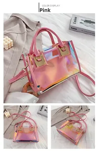 Pink holographic PVC tote bag with leather handles and metallic golden lock detail