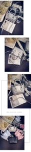 Detail of cat-shaped handbag with embroidery and leather handles in various colors